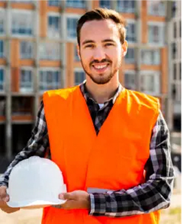 Team member holding helmet